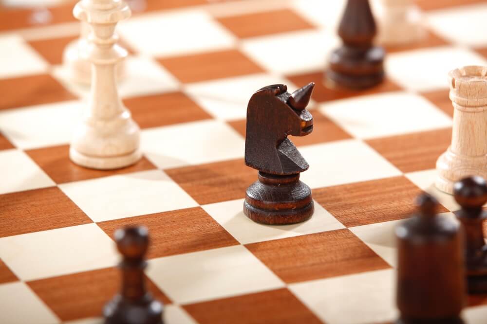 Unicorn chess piece on chess board