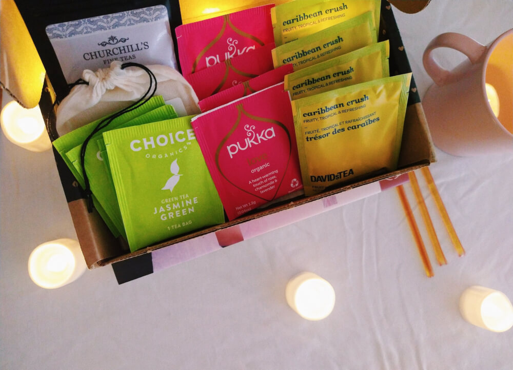 Sips by box displaying teas, close up overhead