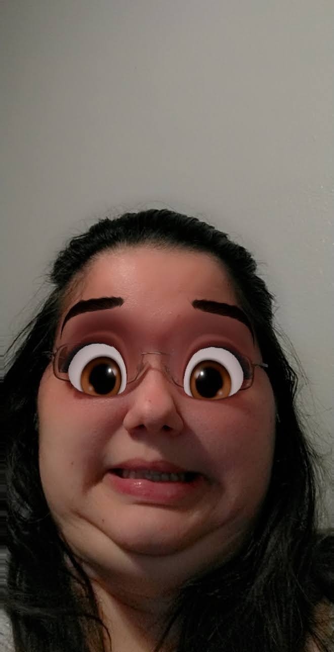 Selfie ft. Snapchat cartoon eyes filter and 😬 facial expression