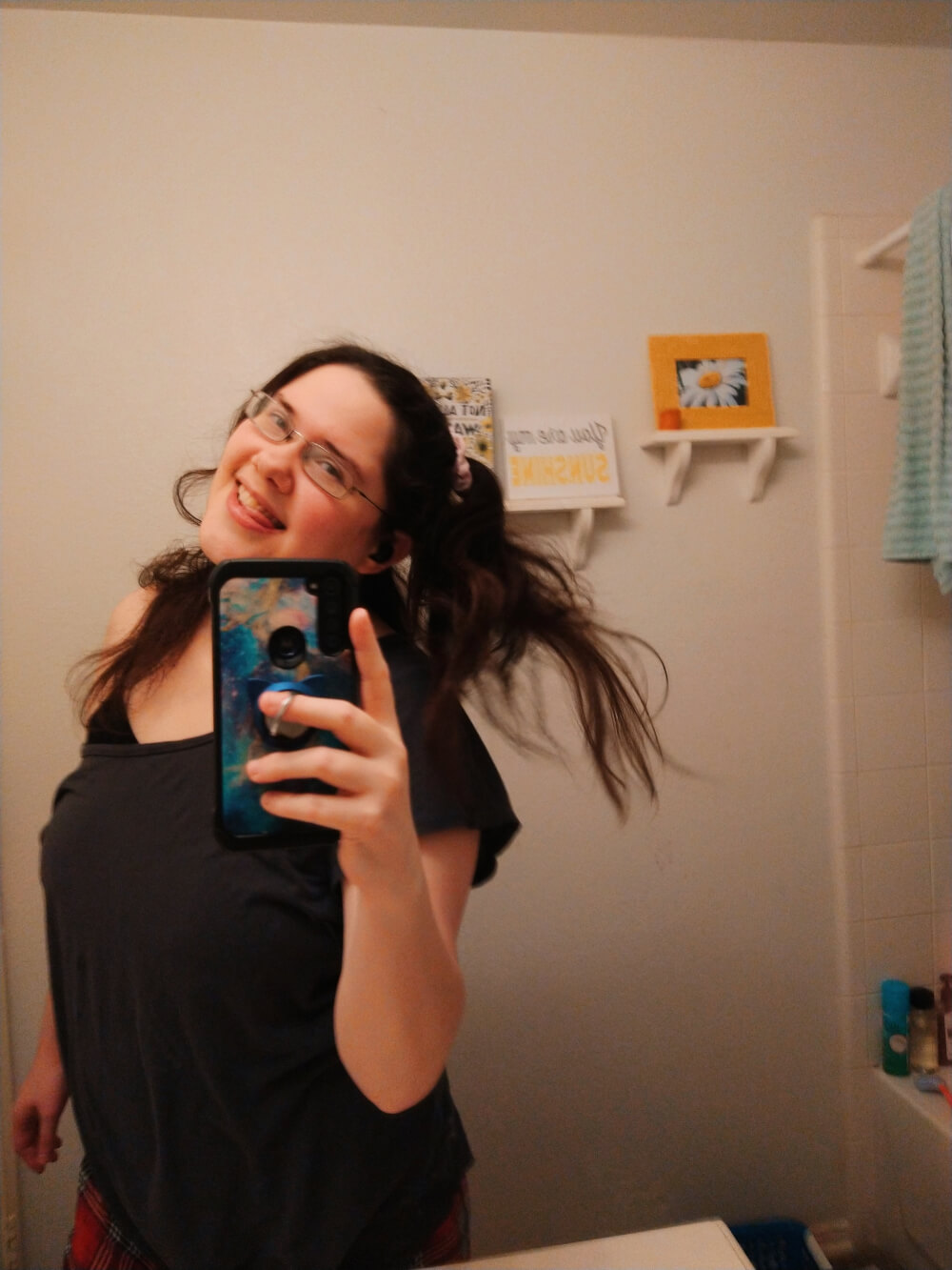 bathroom mirror selfie, unmasked autism, ponytail in motion